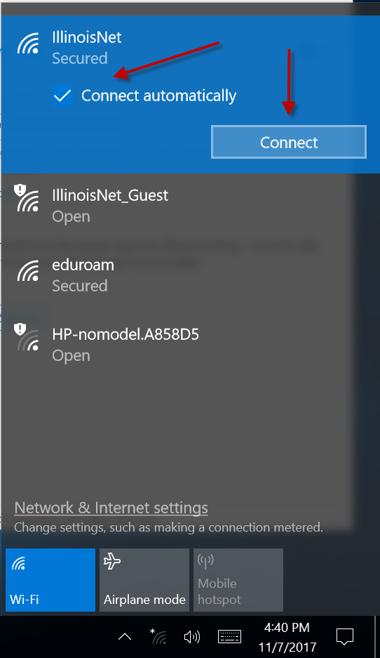 Image of IllinoisNet SSID in wireless network list with arrows pointing to the checkbox for automatic and the Connect button